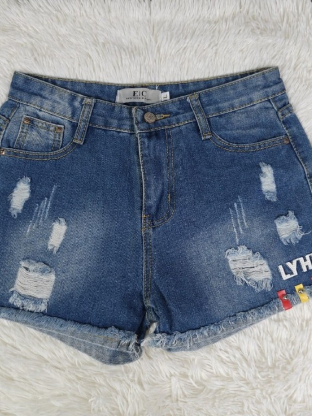 Distressed Denim Cutoff Shorts with Embellishment